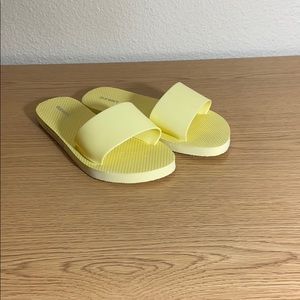 Yellow Old Navy slides